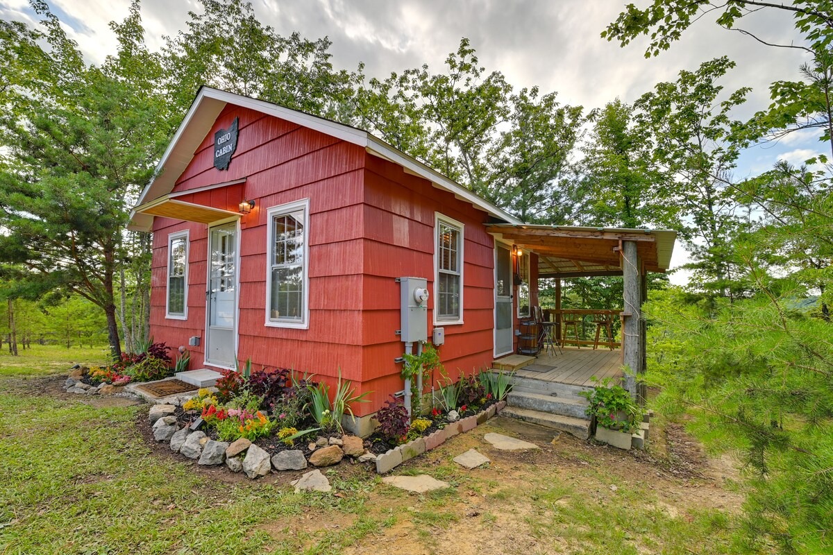 Cabin three-quarter view with flowers